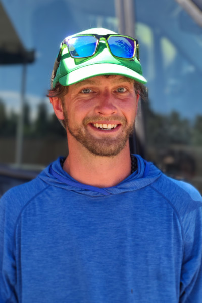 Ben standing in front of van