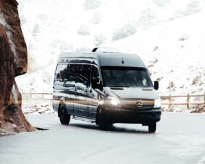 van on snowy roads