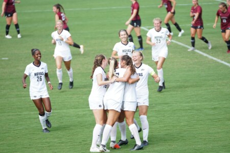 women's soccer team celebrating