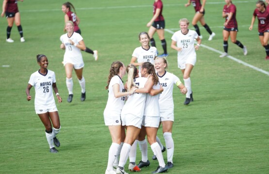 women's soccer team celebrating