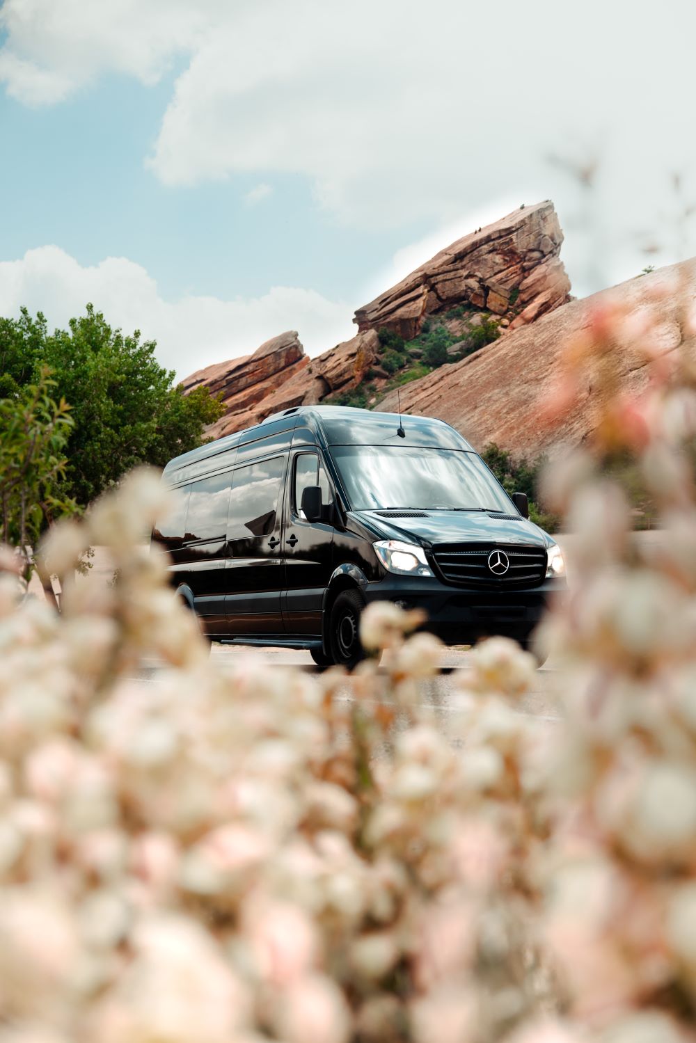 milemarker van in front of Red Rocks